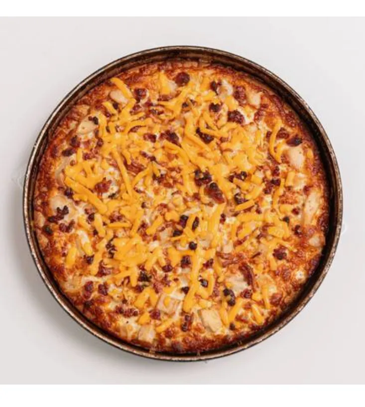 Chicken Bacon Ranch Pizza at Pizza 64 Country Hills - Chicken, bacon, ranch dressing, cheddar and mozzarella