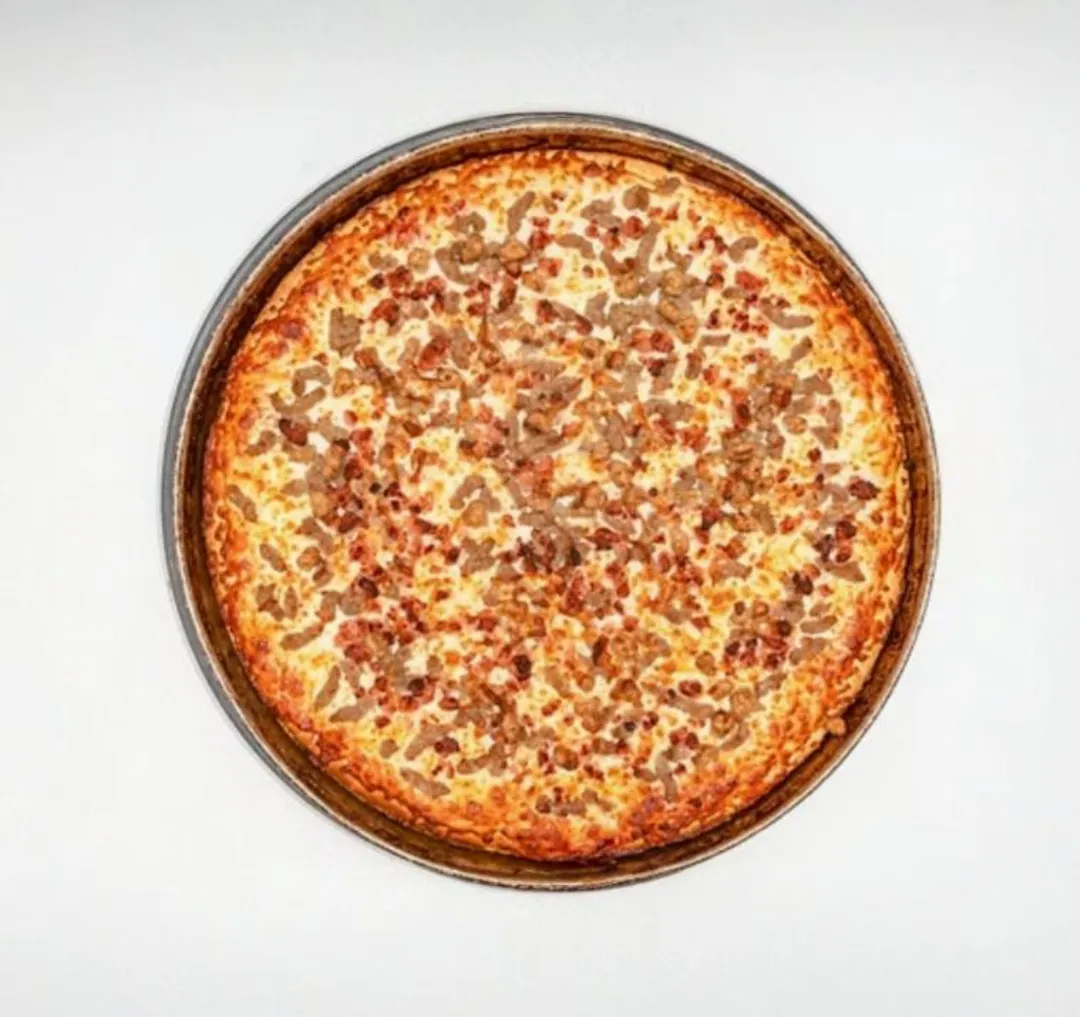 Meat Lovers Pizza at Pizza 64 Country Hills - Pepperoni, ham, beef, Italian sausage and mozzarella